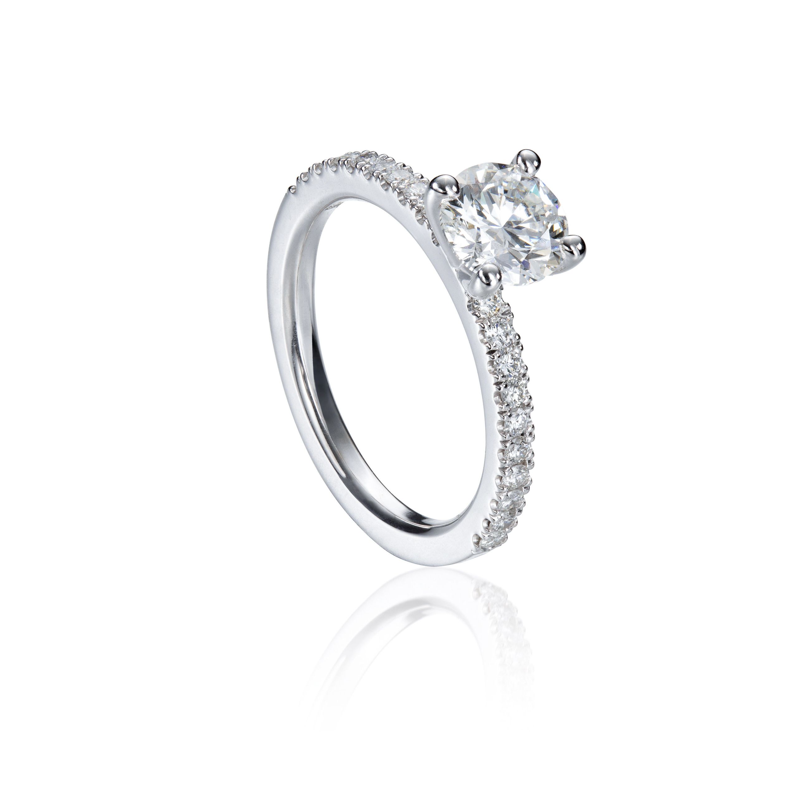 Signature Round Cut Diamond Engagement Ring with Pavé Setting on the Band